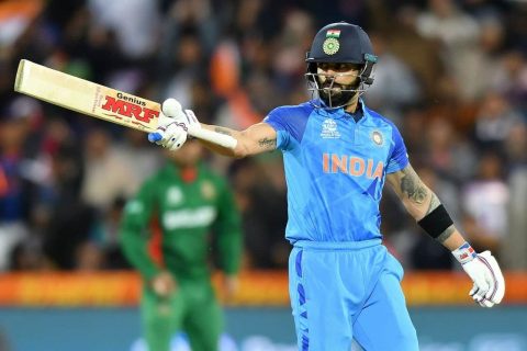 Virat Kohli of India celebrates Half Century