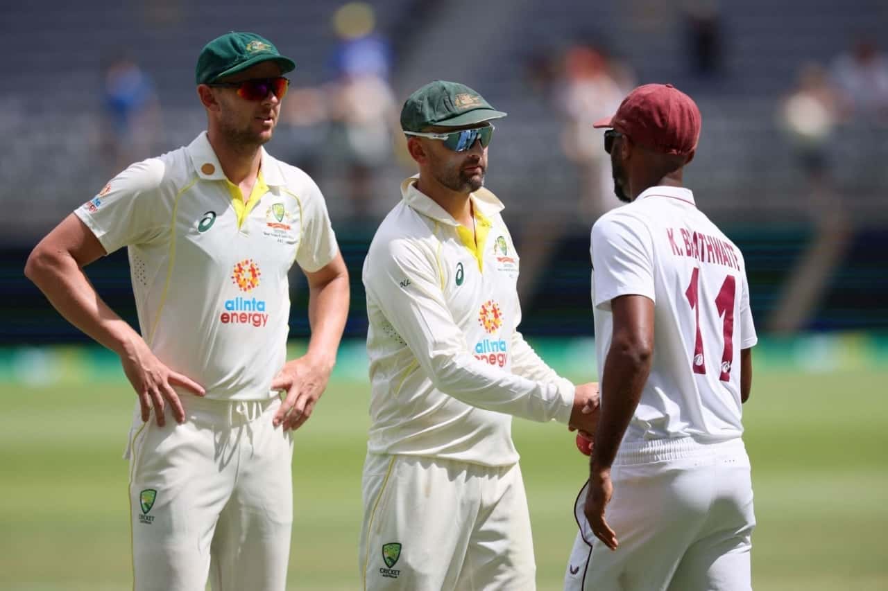 Josh Hazlewood and Nathan Lyon shake hands with Kraigg Brathwaite