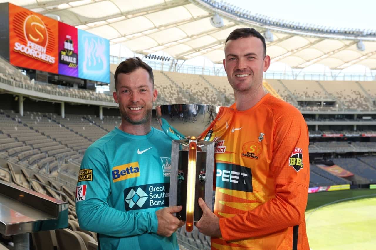 Jimmy Peirson of Brisbane Heat (L) & Ashton Turner of Perth Scorchers with BBL 2022-23 Trophy ahead of the Final