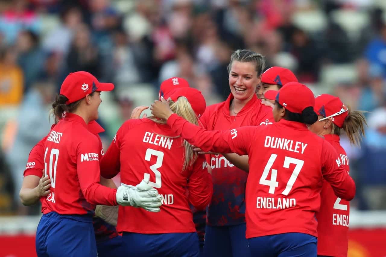 Lauren Bell of England celebrates with teammates