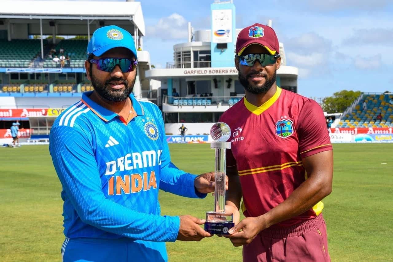 Rohit Sharma of India and Shai Hope of West Indies pose with the ODI trophy IND vs WI 2023