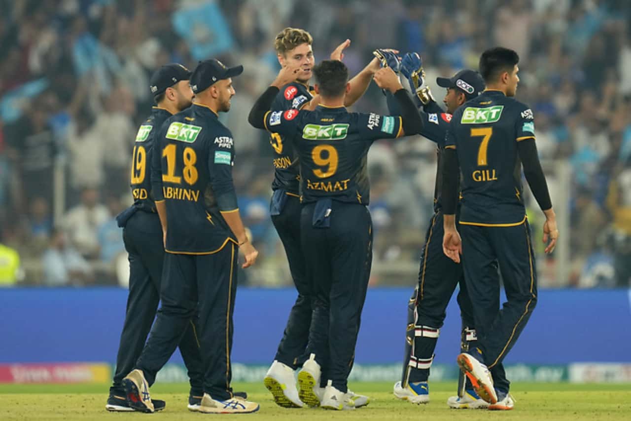 Spencer Johnson of Gujarat Titans celebrating with teammates