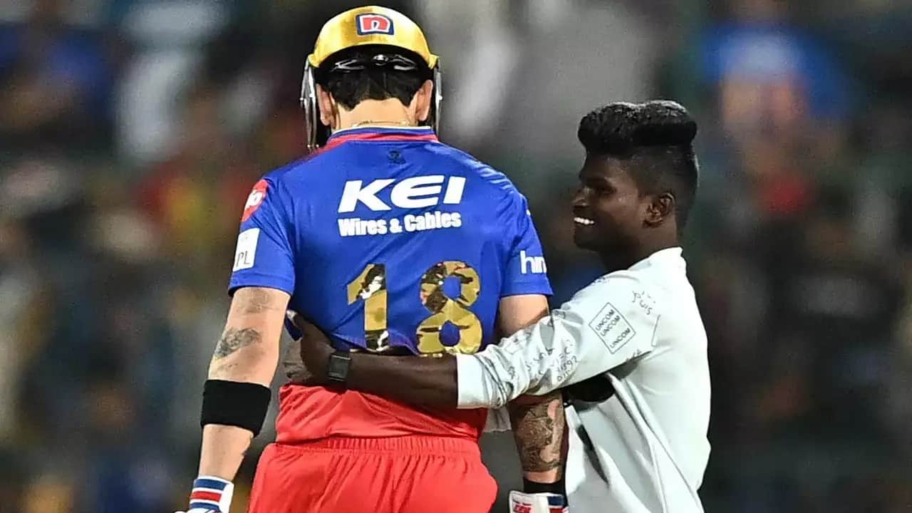 Virat Kohli Fan Detained after Invading Pitch