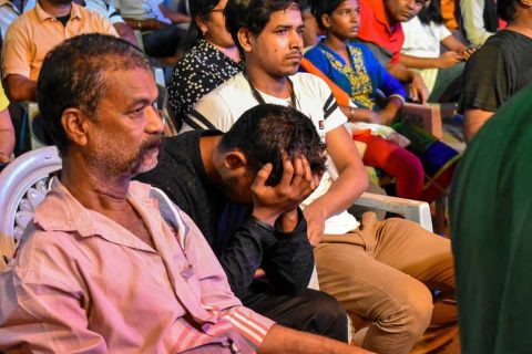 A cricket fan seen in disappointment