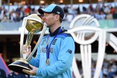 Eoin Morgan of England lifts the Cricket World Cup Trophy