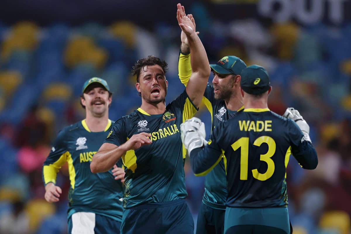 Marcus Stoinis of Australia celebrates with teammates